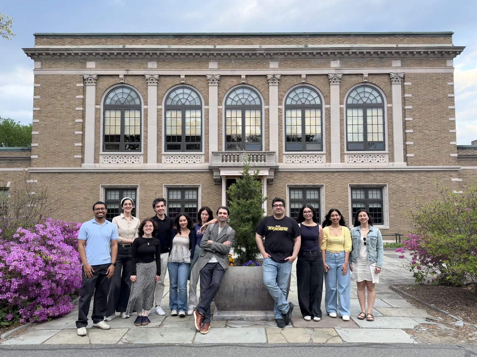 The Culture and Morality Lab together outside on the UMass Amherst campus in spring.